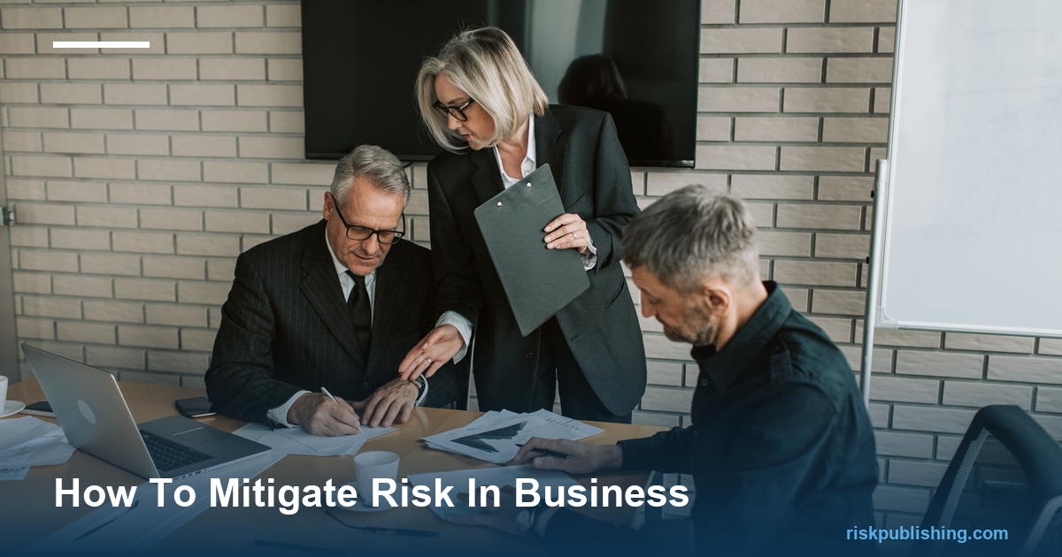 Leadership team reviewing how to mitigate risk in business during a strategy meeting.