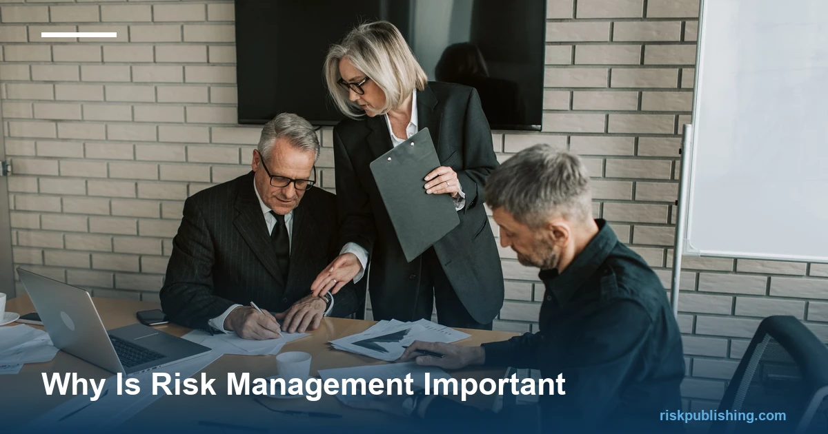 Why risk management is important: executives reviewing and signing risk documents in a boardroom meeting